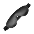 Load image into Gallery viewer, The black Kinklab Bondage Basics Padded Leather Blindfold is displayed against a blank background. The blindfold has a black elastic strap.
