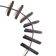 Load image into Gallery viewer, A close-up of a few spaced-apart clothespins from the Extreme Full Body Zipper are displayed against a blank background.