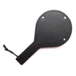 Load image into Gallery viewer, The Black Leather Gentle Persuasions Paddle is shown against a blank background with the leather side up. The entire paddle is covered in smooth black leather.