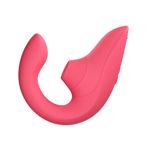 A Womanizer Blend suction vibrator in bright pink color, seen from the side on a white background. 